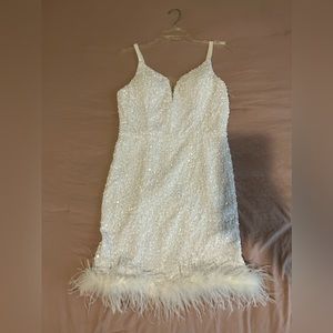 White sequin and feather dress